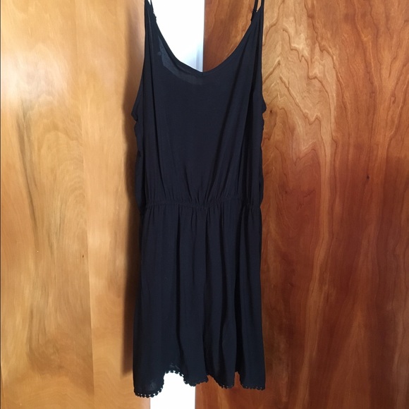 black romper with leg embellishments