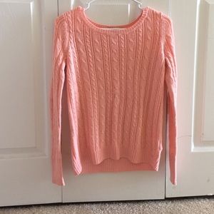 light orange sweater