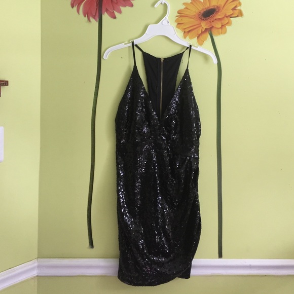 Black dress | deep V neck | caged side cut outs