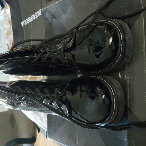 Black patent leather combat boot
