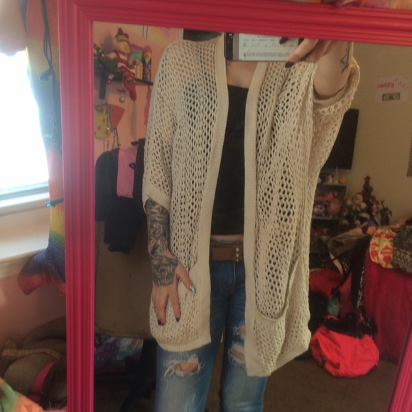 Long opened knitted sweater
