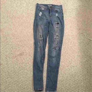 High waisted distressed jeans