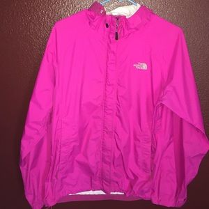 Pink North face windbreaker.
