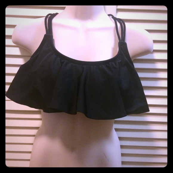 Black VS swim top and Gold & Black Sweater