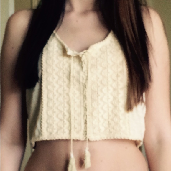 Cream colored crop top.