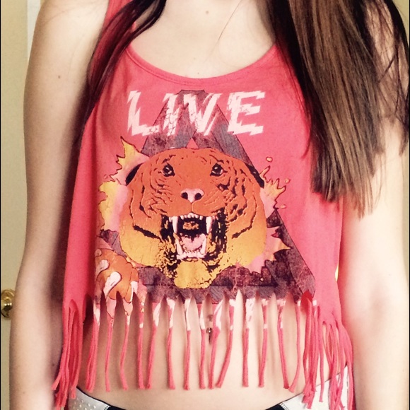 Pink crop top with fringe.