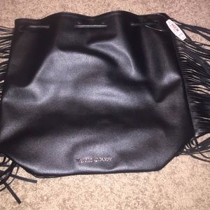 Victoria's Secret leather draw string fringe tote
