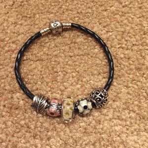 Pandora black leather bracelet with charms