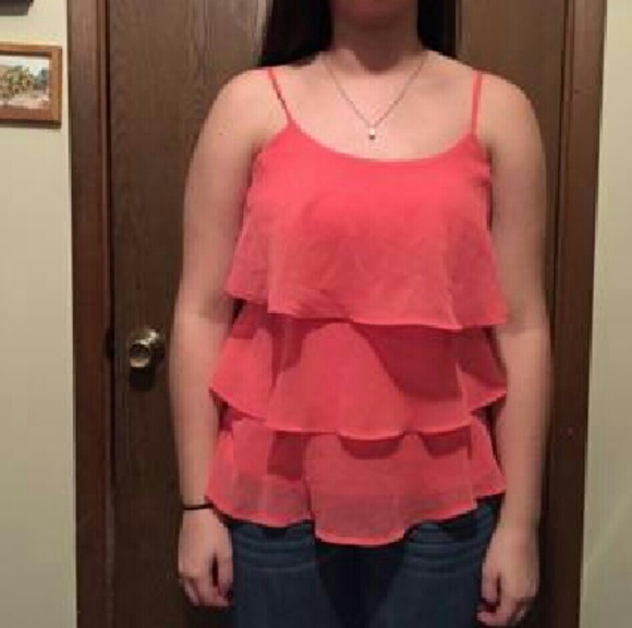 pink/coral ruffle shirt