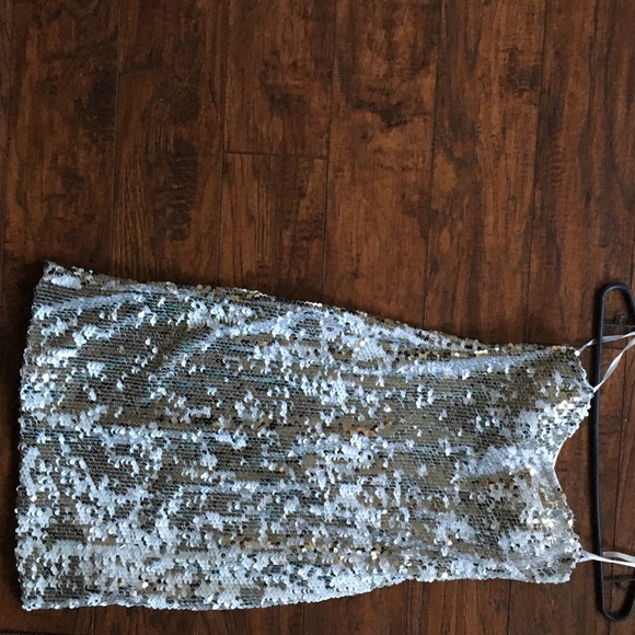 Short sequined dress.