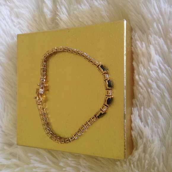 Gold plated bracelet with clear and 4 black stones - Picture 1 of 3