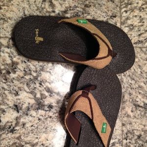Sanuk boys flip flops.