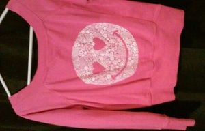 pink smiley face sweater