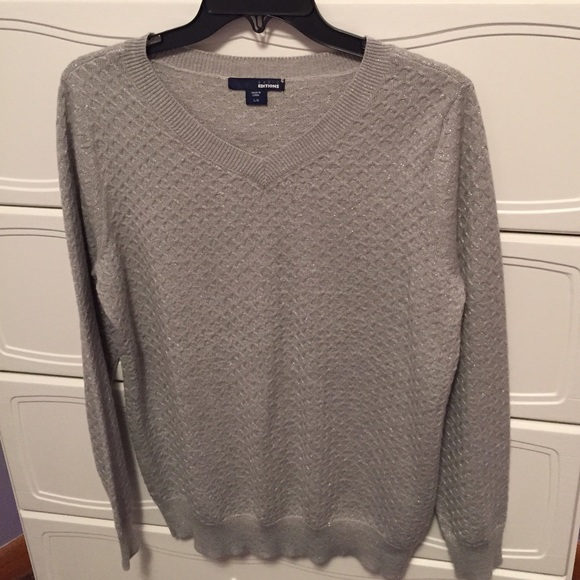 Gray sparkly sweater.