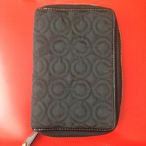 Coach planner, black stitched embossed fabric.