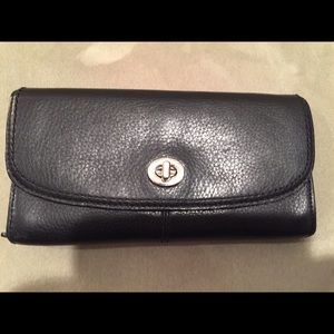 Coach. Black leather wallet. Excellent condition.