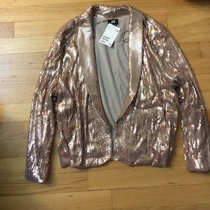 Rose gold sequin blazer.