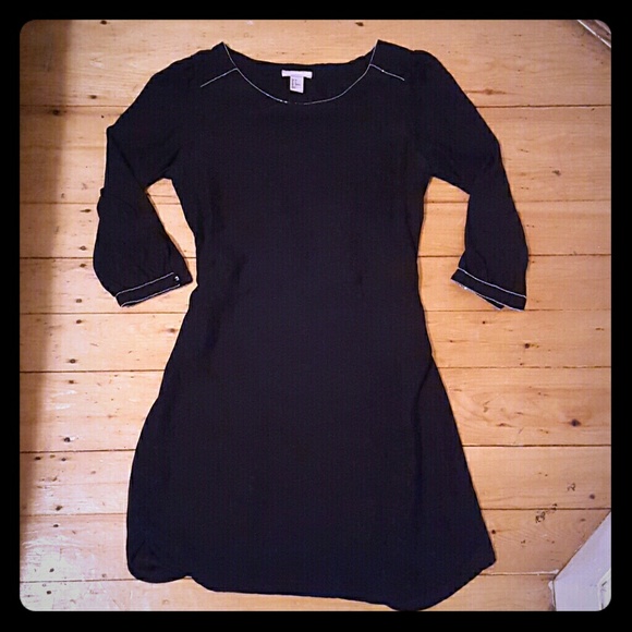 Great black dress with silver trim.