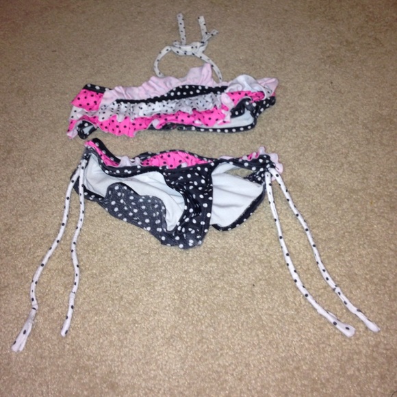 Pink white and black bikini top and bottom.