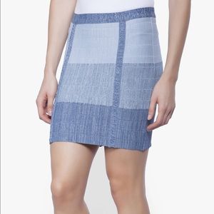 BEBE Denim style bandage skirt.