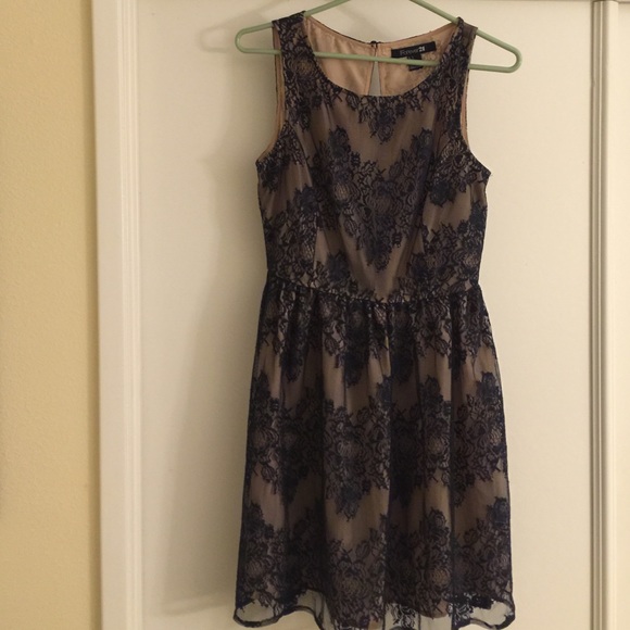 Blue and cream dress with lace overlay