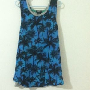A blue palm tree shirt