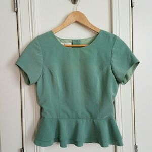 Peplum blouse in green