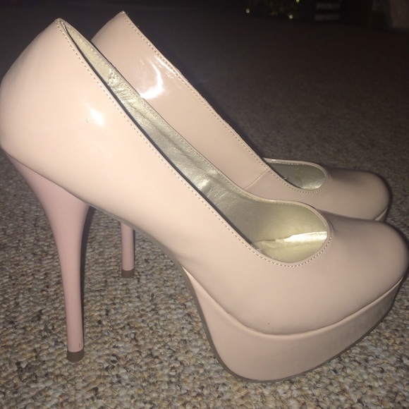 Nude platform pumps. Women's size 9