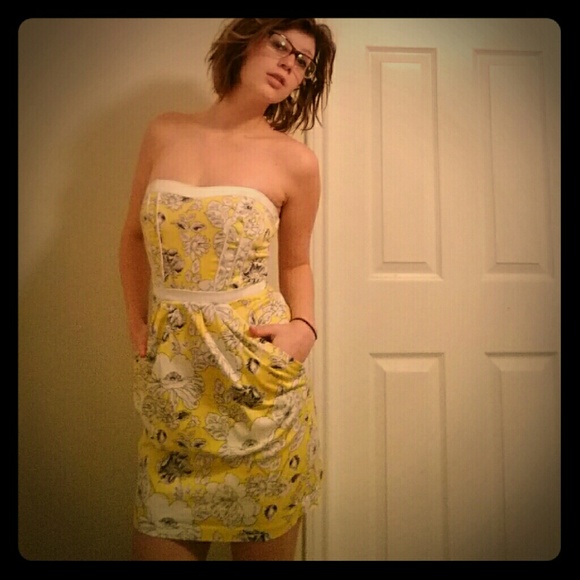 Strapless Yellow dress with white flowers.