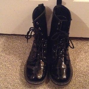 Shiny black combat boots