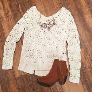 Sea foam green Anthropologie sweater.