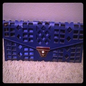 Royal blue laser cut clutch