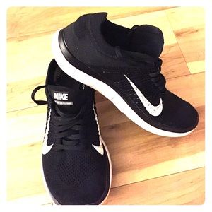 Black and White Jersey Knit Nike Sneakers.