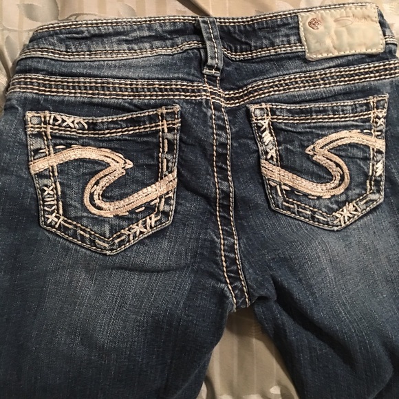 Dark wash silver jeans