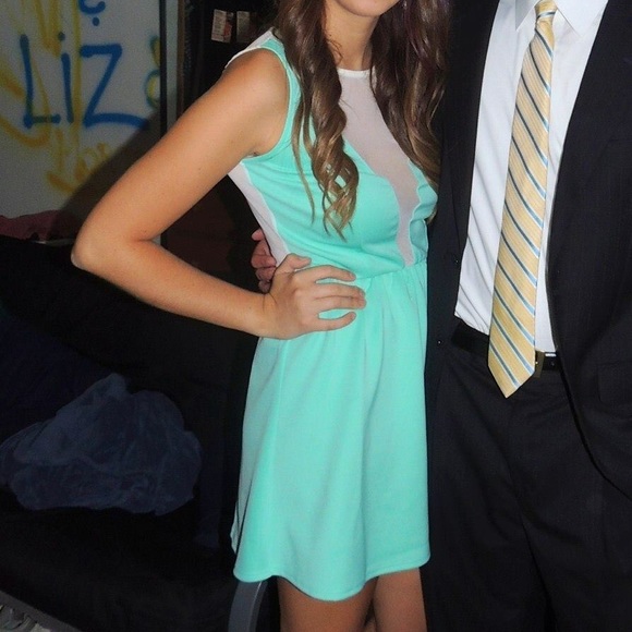 mint dress with white lace back and v-neck middle