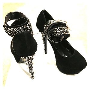 Studded black heels.
