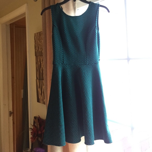 Teal polkadot fitted dress.