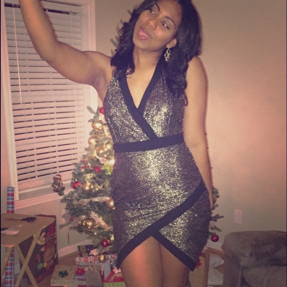 Flashy black and gold dress.