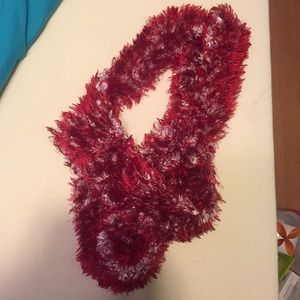 Red and white hand knitted scarf