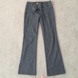 Black and white dress pants with slight flare.