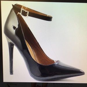 Brand new high heels in original box.