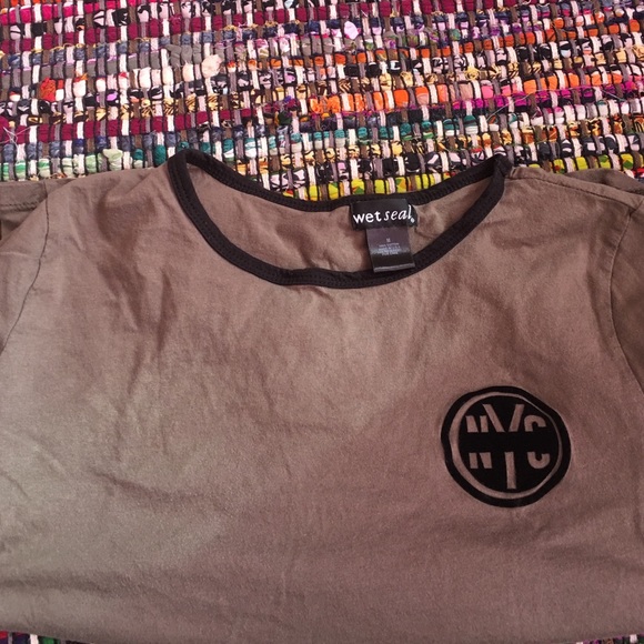 army green NYC shirt.