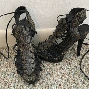 Lace up snake print high heels