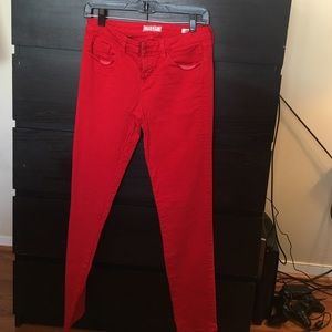 Red skinny Guess jeans