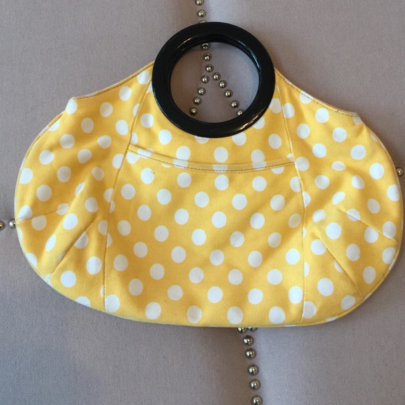 Yellow polka dots handbag.