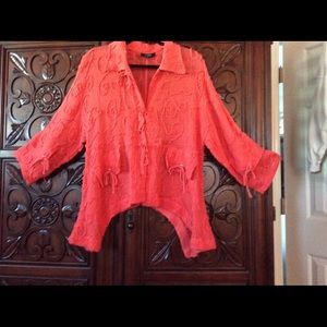 Salmon color shark tail jacket size L with snaps