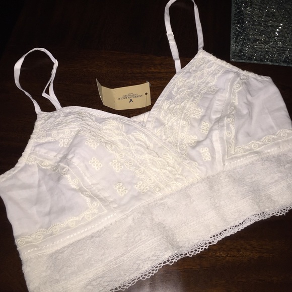 NWT cream lace crop top