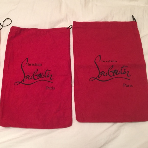2 one shoe each Christian Louboutin dust bags