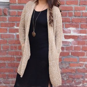 Tan knit long sweater.