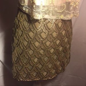 An absolute stunning sequence golden mini skirt